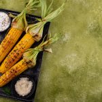 Grilled corn cobs with parmesan cheese